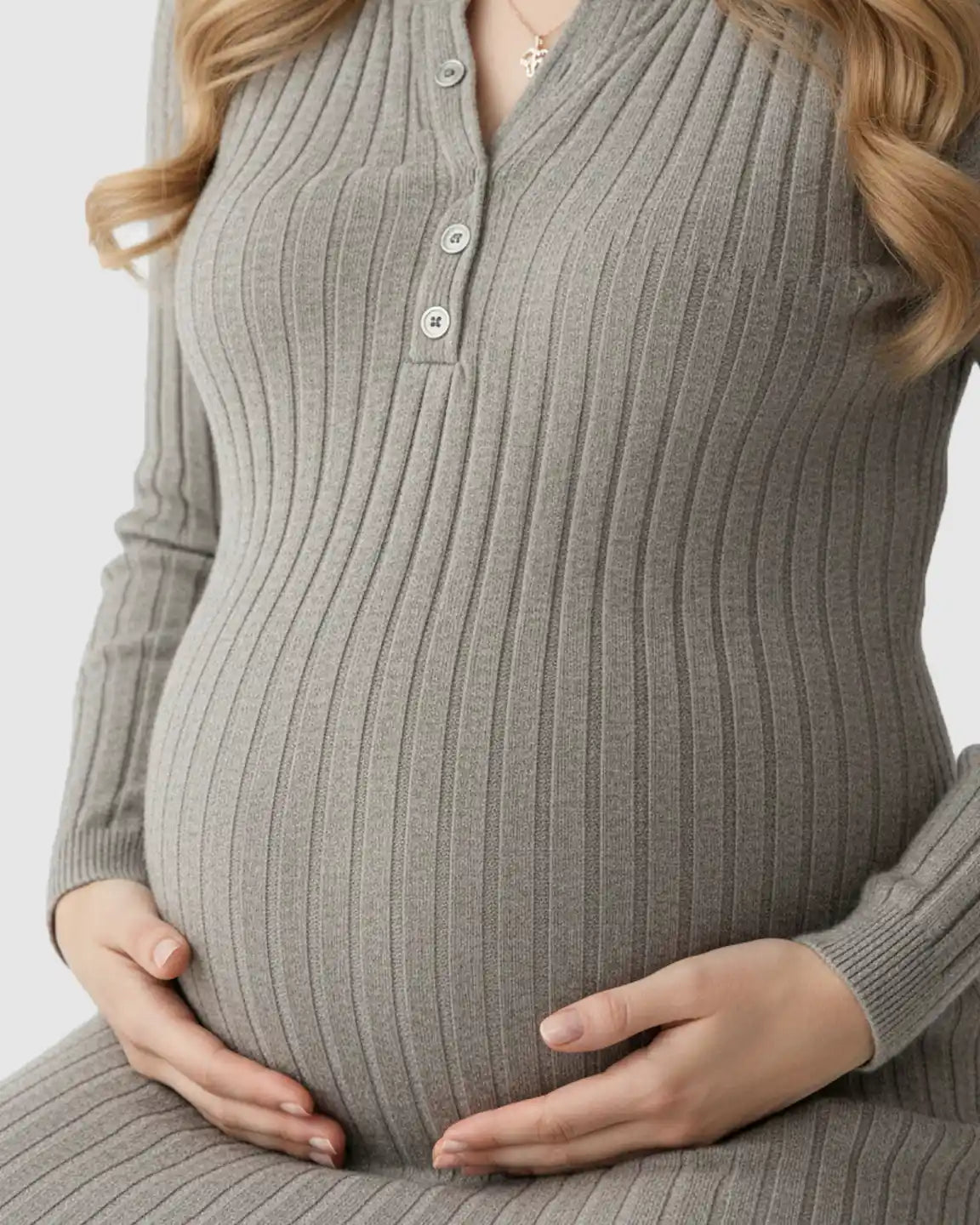 Maternity maxi dress in gray ribbed knit with long sleeves and a button-front henley neckline.