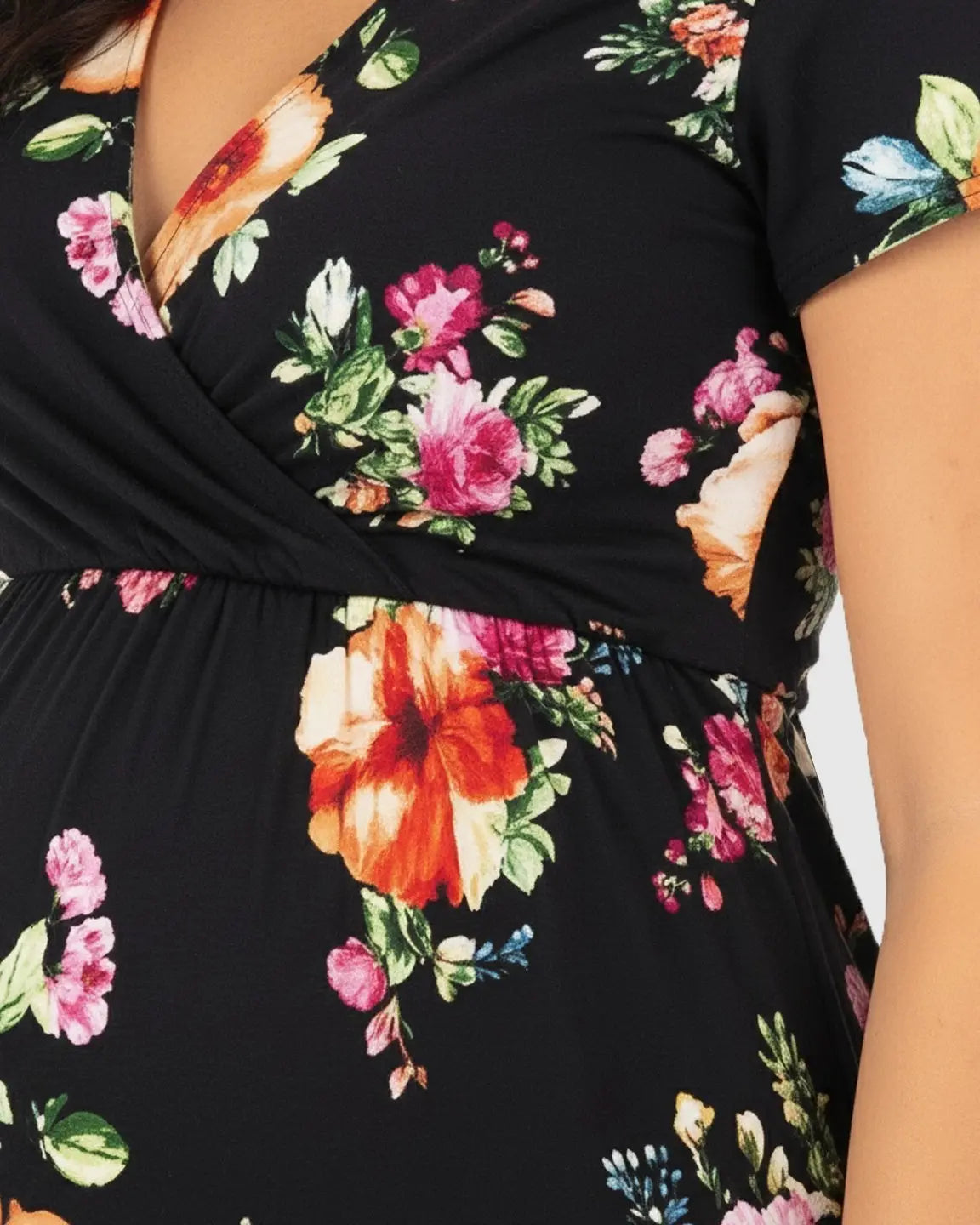 Black floral V-neck short sleeve maternity maxi dress with pink, orange, and white flowers.