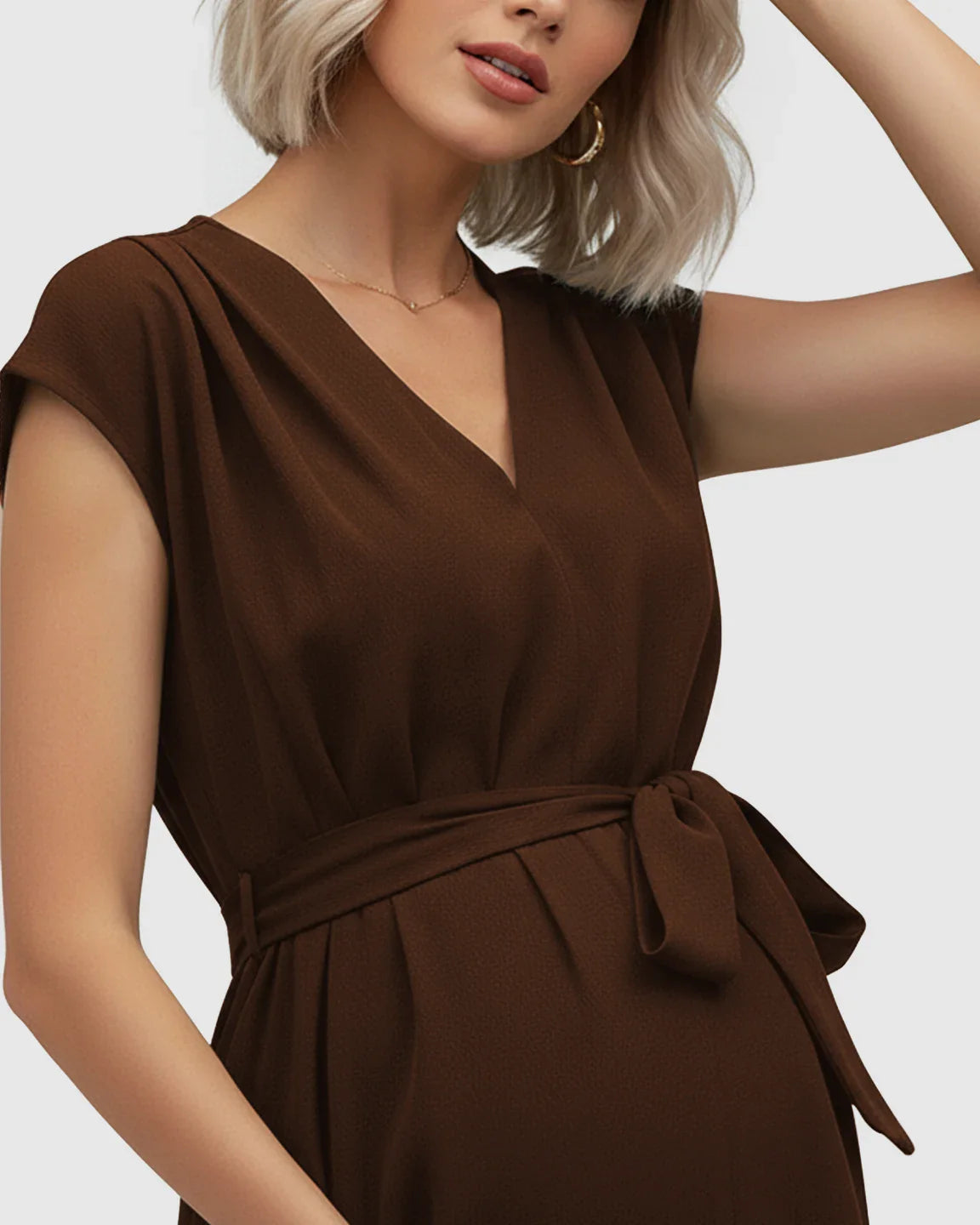 Maternity midi dress in brown with a V-neck, flutter sleeves, and adjustable tie-waist.