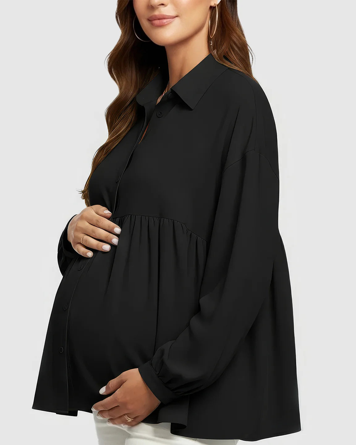 Black chiffon maternity shirt with lapel collar, button-down front, and loose babydoll fit, worn by a pregnant woman.