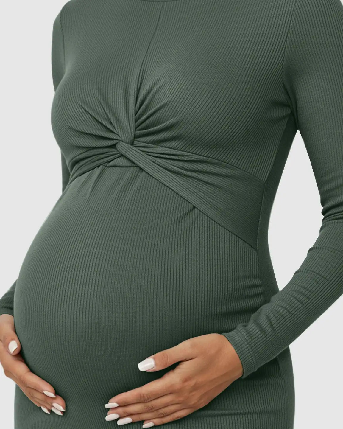 Olive green ribbed maternity bodycon dress with a twist-front detail, long sleeves, and empire waist.