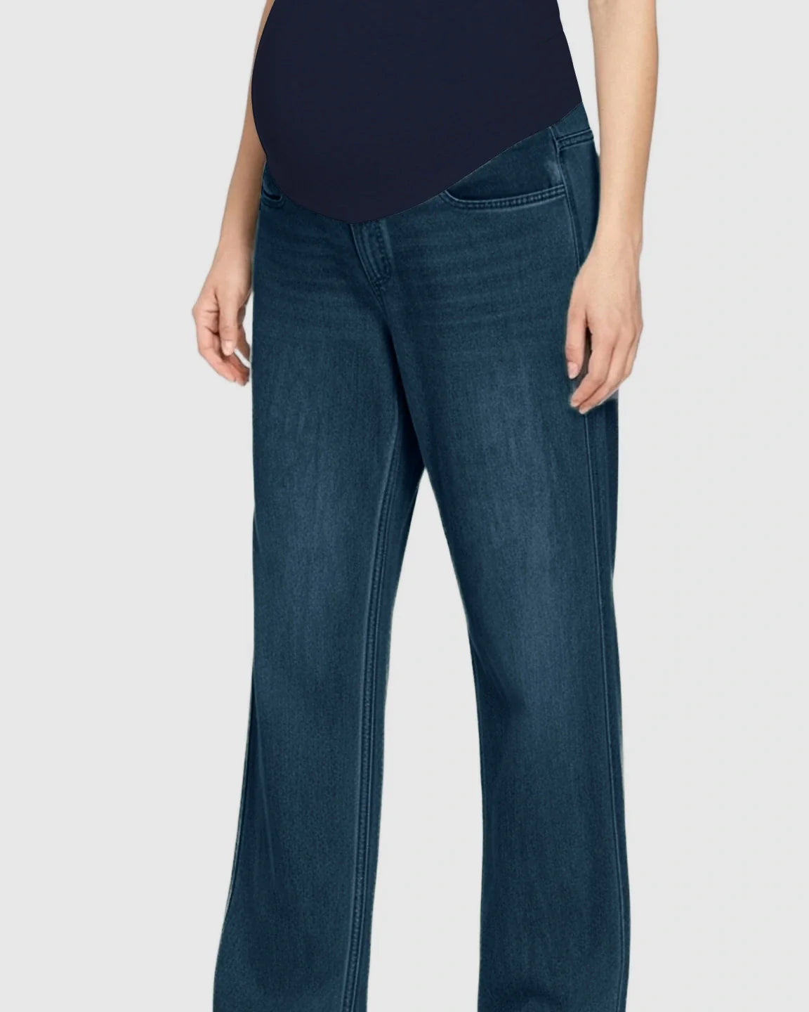 Dark blue straight-leg maternity jeans with a navy over-the-belly panel, shown on a pregnant model.