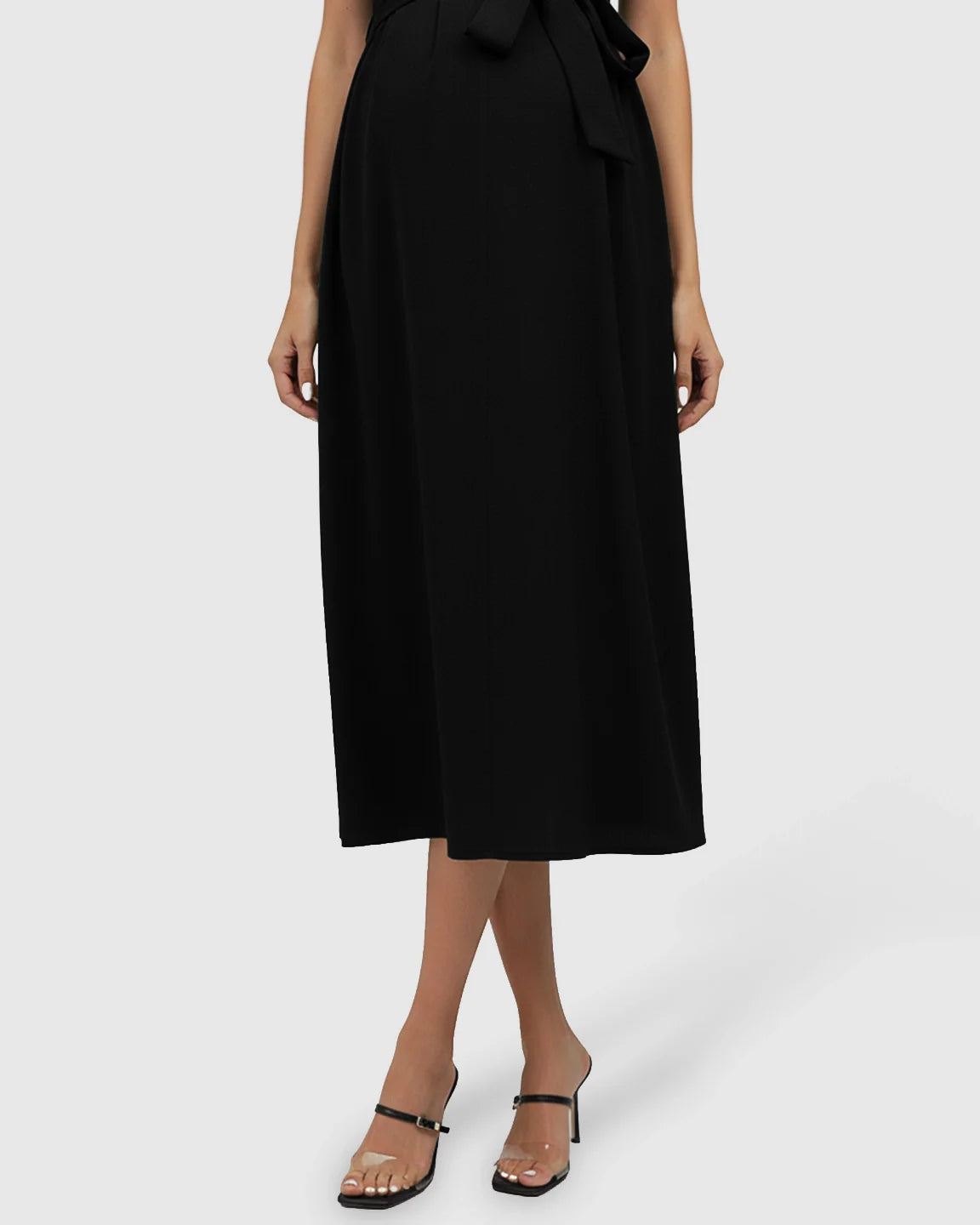 Black tie-waist V-neck maternity midi dress with flutter sleeves, flowing over the bump.