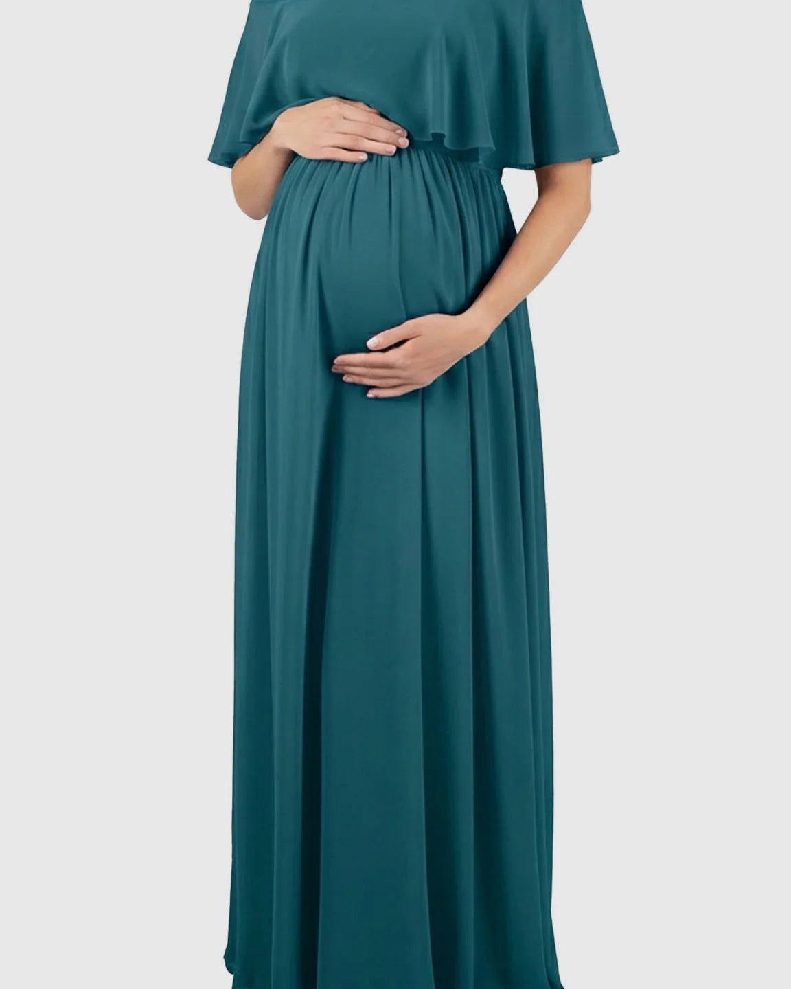 Teal chiffon off-shoulder bohemian maternity photoshoot dress with a flowy silhouette, highlighting a pregnant belly.