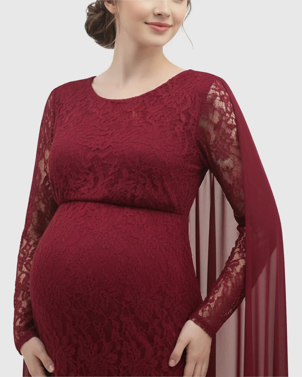 Maternity photography gown in deep red lace with sheer chiffon cape sleeves, empire waist, and long sleeves.