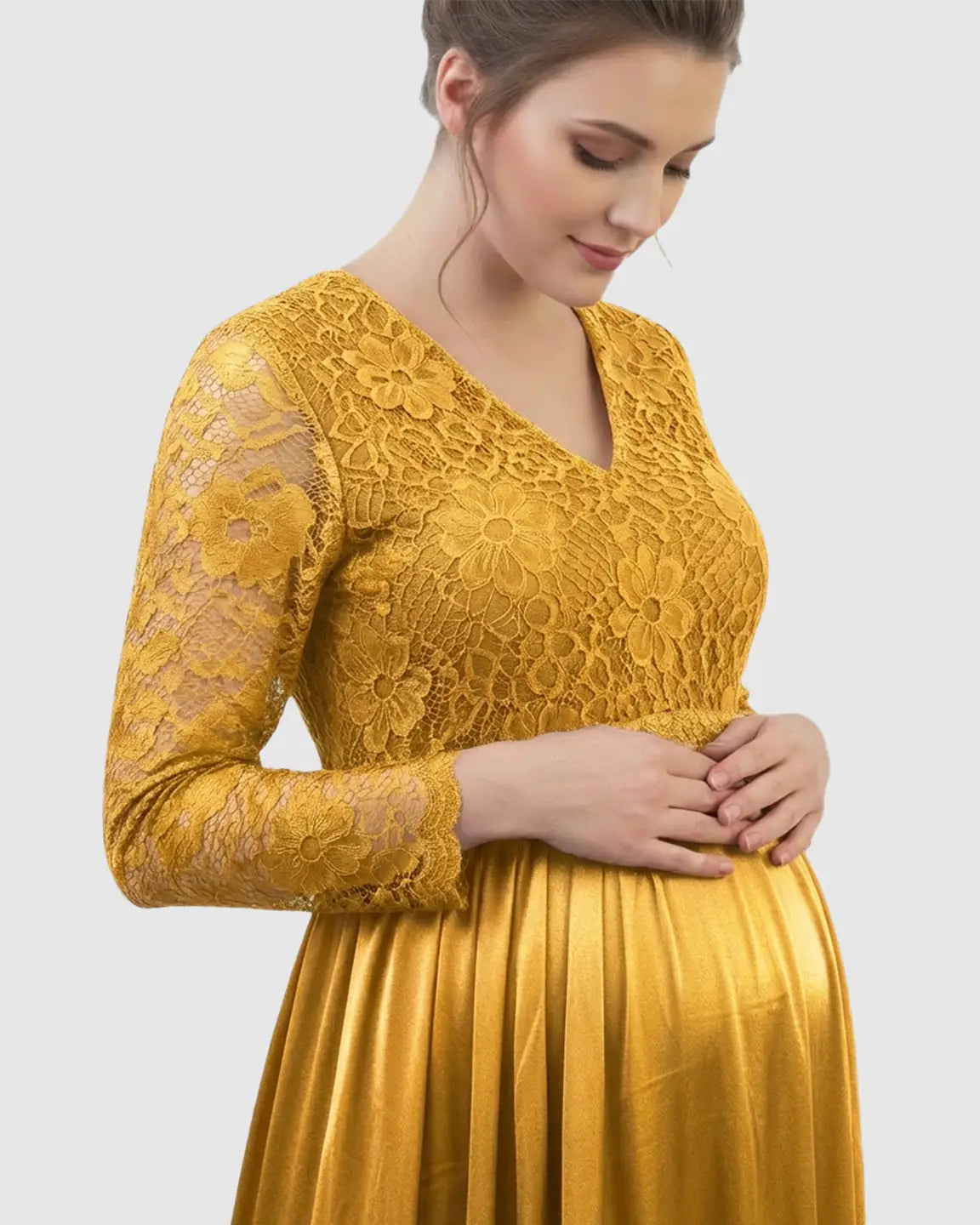 Golden yellow lace-spliced V-neck maternity maxi dress with long sleeves and a flowing skirt.