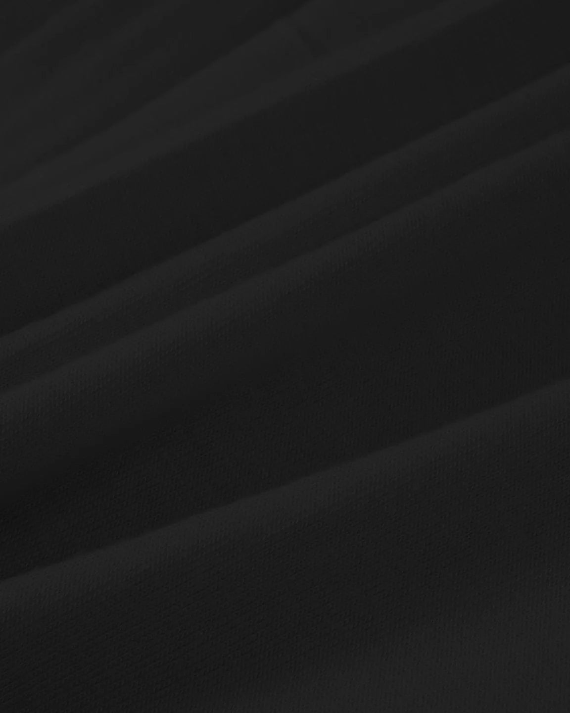 Close-up of the soft, black draped fabric of the Bump Society Twist Front Draped Maternity Nursing Maxi Dress.
