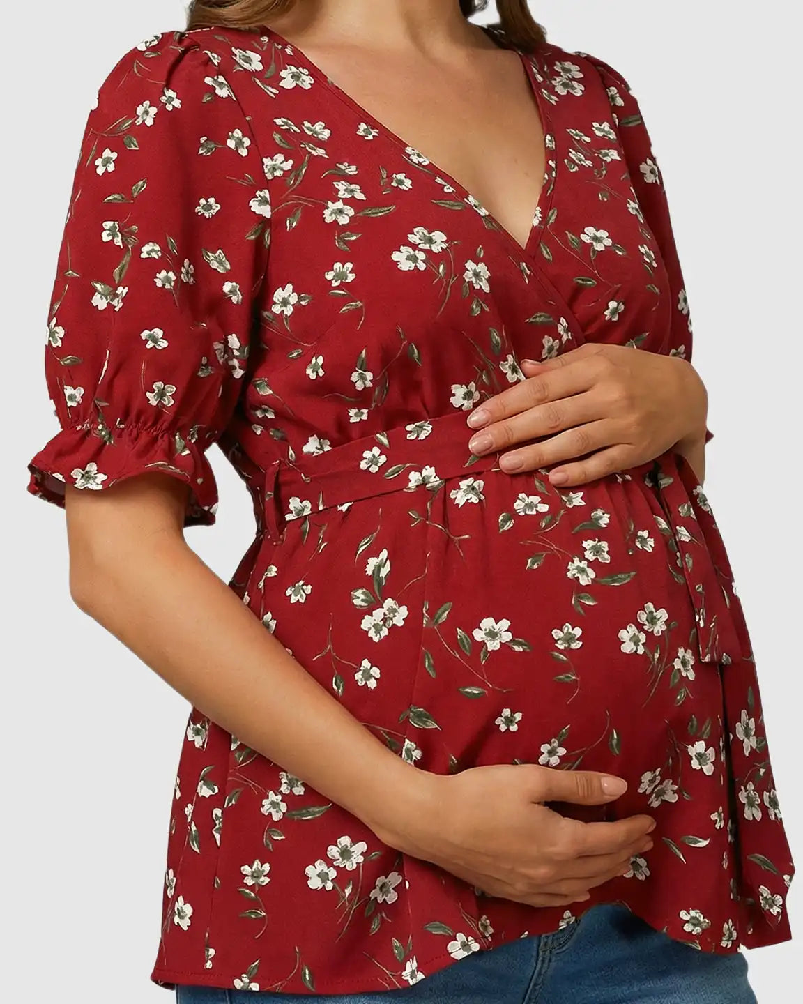 Red floral crossover V-neck maternity & nursing top with puff sleeves and tie waist.