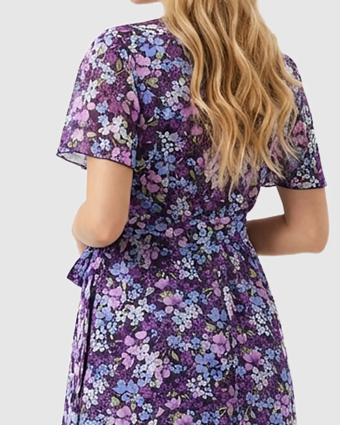 Purple floral V-neck maternity midi dress with ruffled hem and short sleeves, tied at the waist.