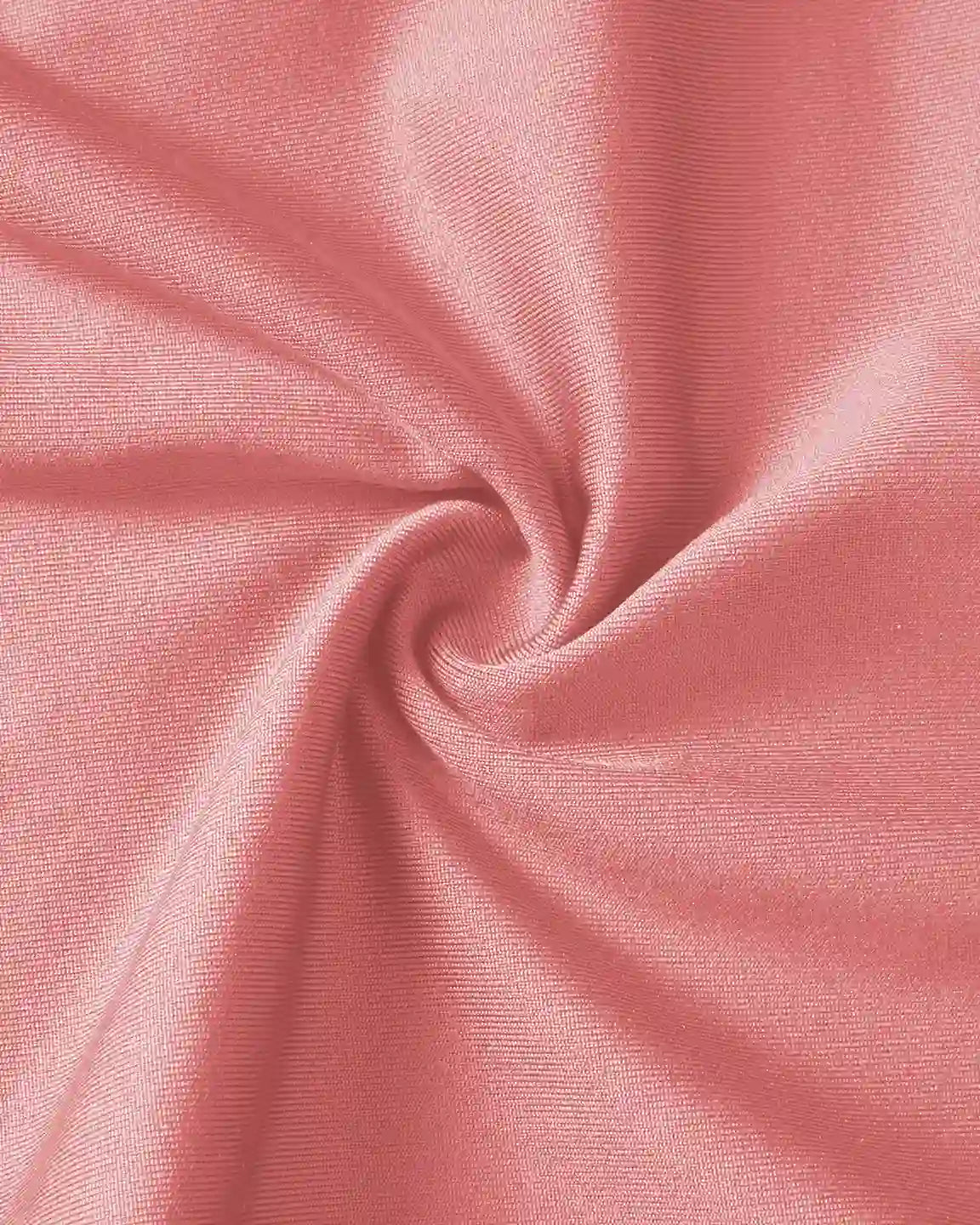 Close-up of soft, stretchy pink fabric, likely for supportive slim-fitting maternity joggers.