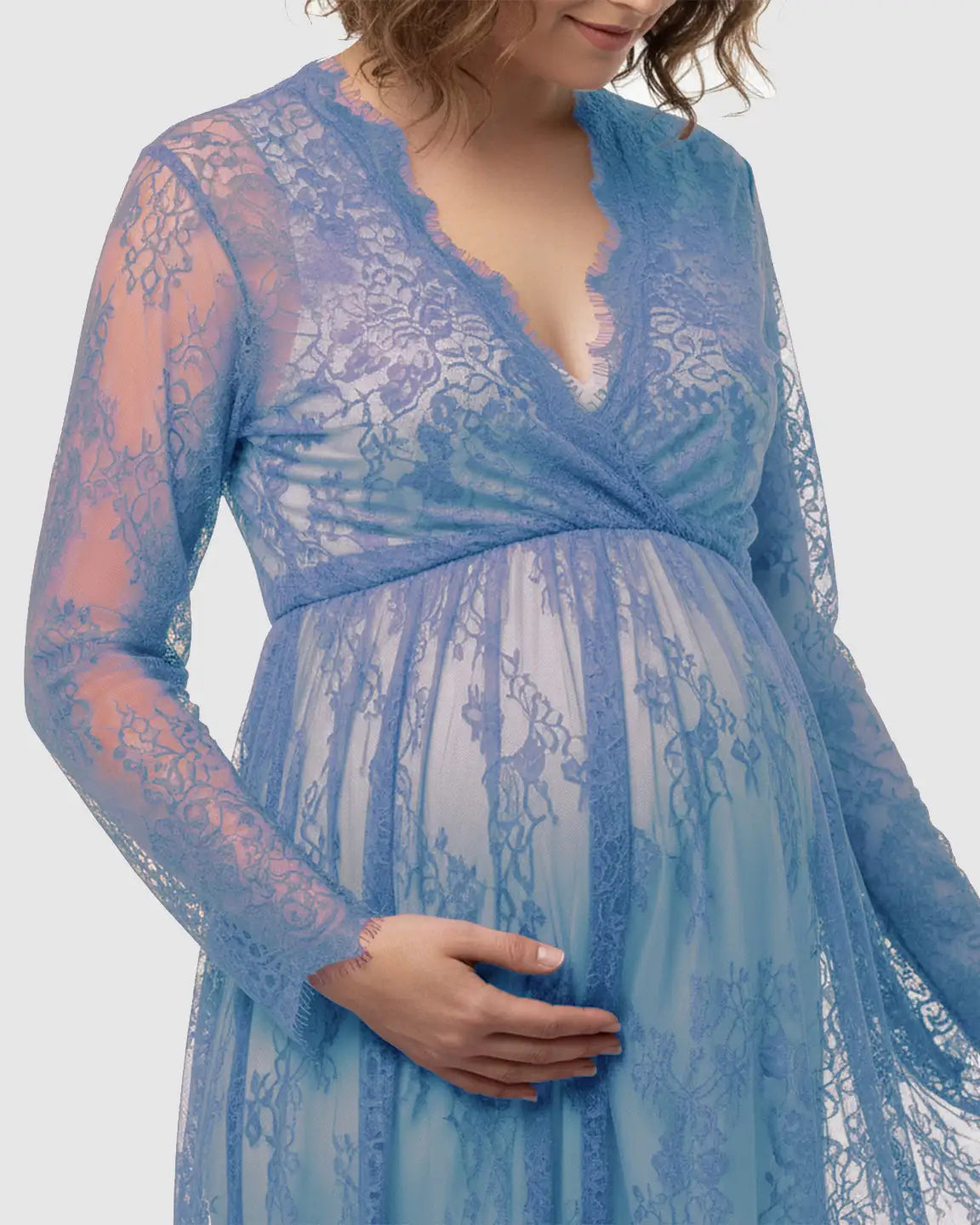 Blue sheer floral lace empire waist maternity maxi dress with V-neck, long sleeves, and flowing skirt.