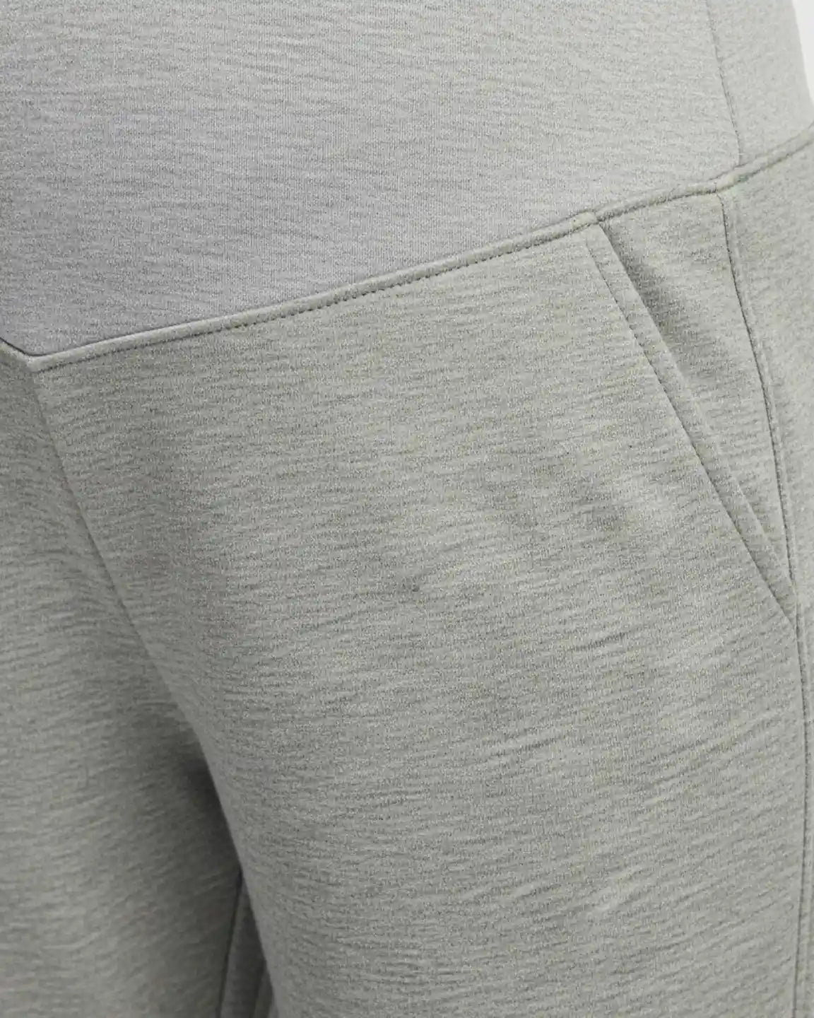 Soft knit light grey maternity joggers with a contoured waistband and side pocket.