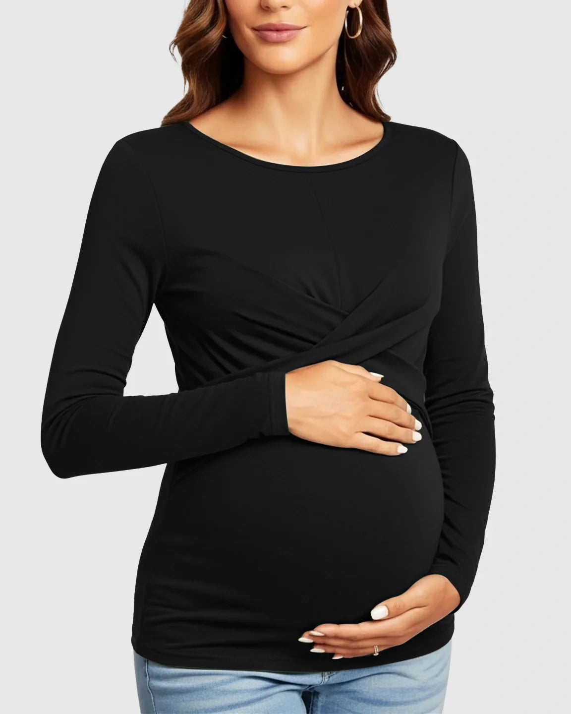 Black cross-pleat fitted long sleeve maternity top with round neckline, soft stretch fabric, and elegant twist-front detail.