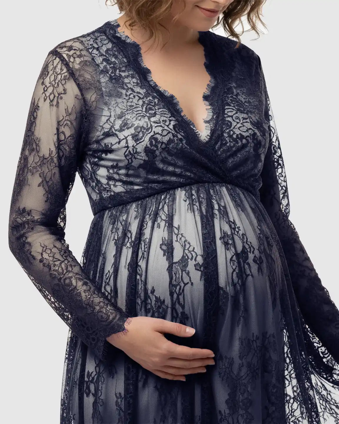 Navy sheer floral lace empire waist maternity maxi dress with long sleeves.