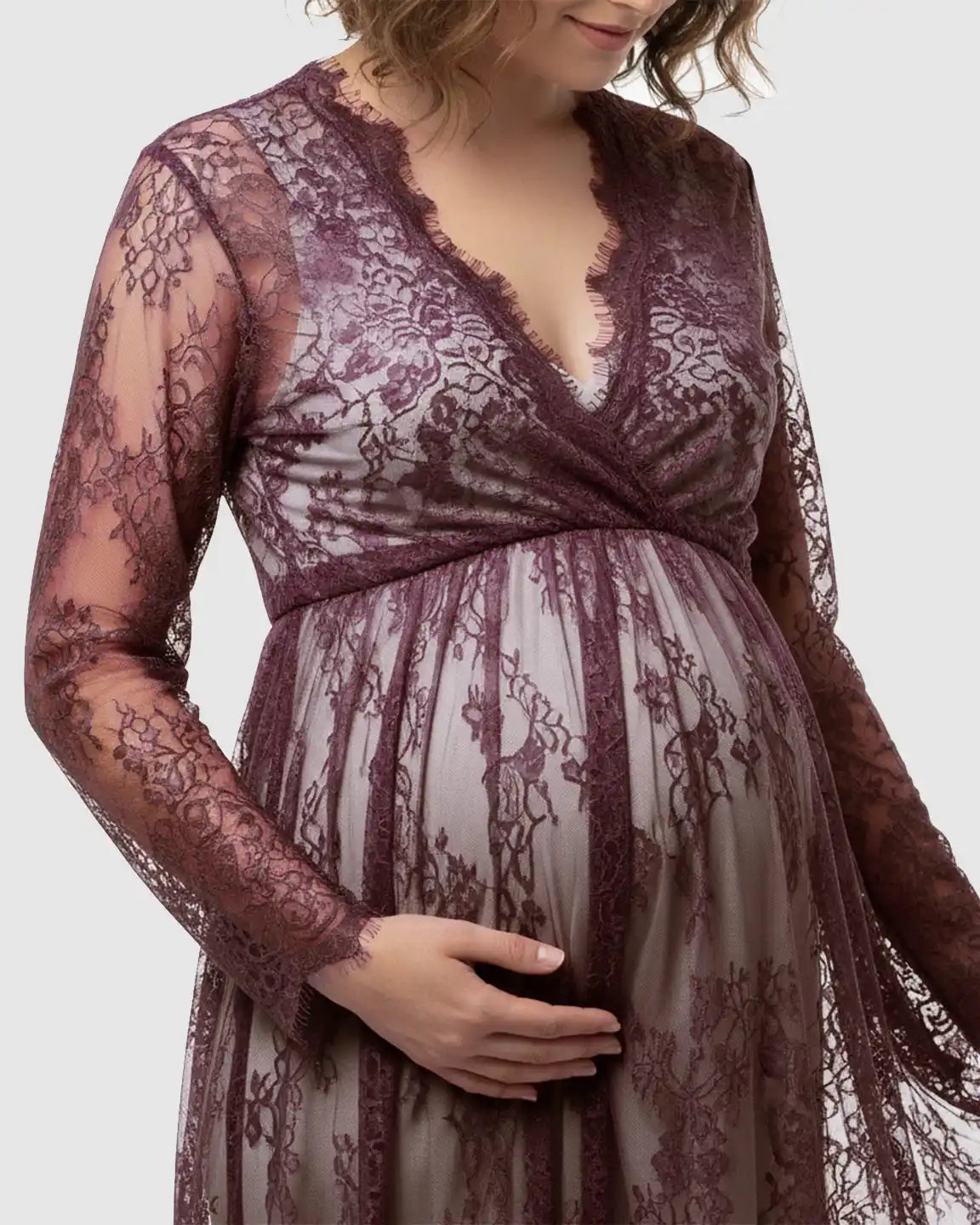Plum sheer floral lace empire waist maternity maxi dress with long sleeves.