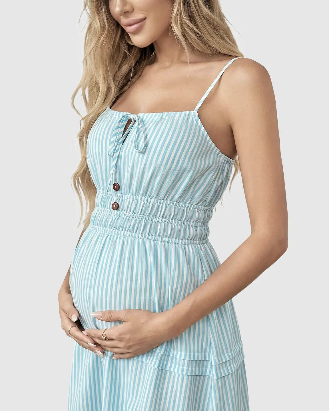 Maternity midi dress: blue and white striped, smocked waist, spaghetti straps, button-front, tiered A-line skirt.