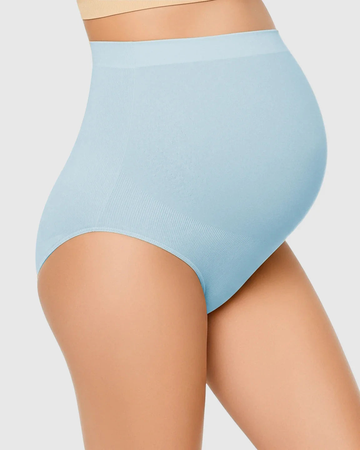 Light blue high-waist seamless maternity underwear on a pregnant belly, offering gentle support.