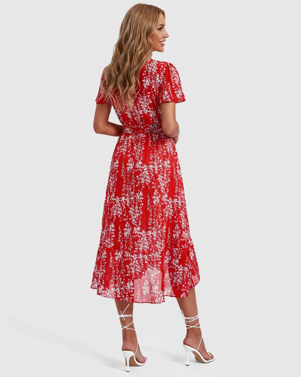 Red floral V-neck ruffled hem maternity midi dress with short sleeves, worn by a smiling woman.