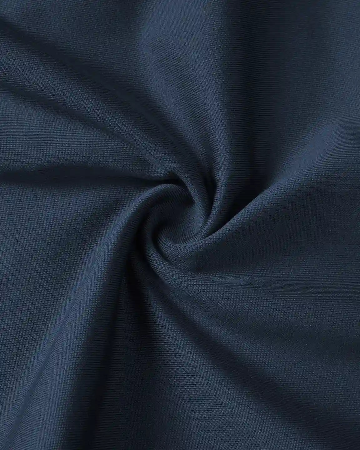 Close-up of dark navy blue, soft, stretchy fabric, likely for supportive slim-fitting maternity joggers.