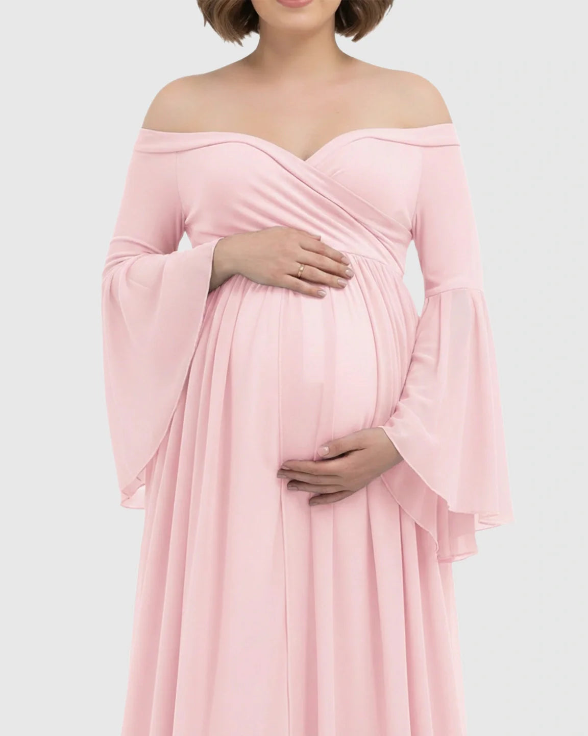 Pink off-shoulder maternity gown with bell sleeves and a long train, perfect for photoshoots.