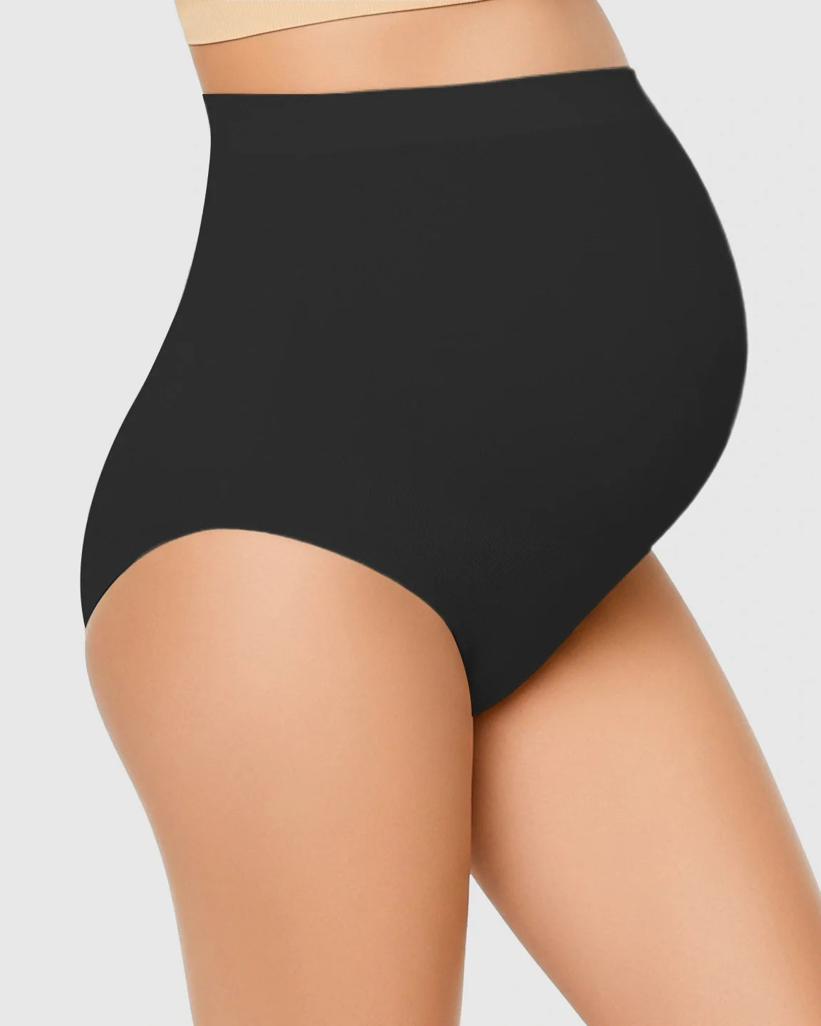 Black high-waist seamless maternity underwear on a pregnant torso, offering gentle belly support.