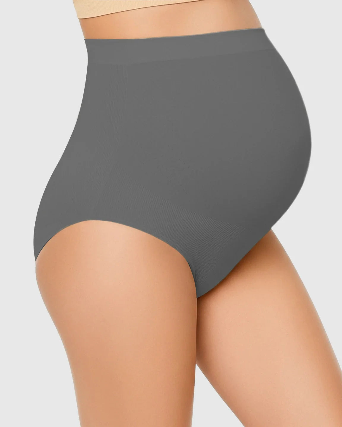 Gray high-waist seamless maternity underwear on a pregnant belly, offering gentle support and comfort.