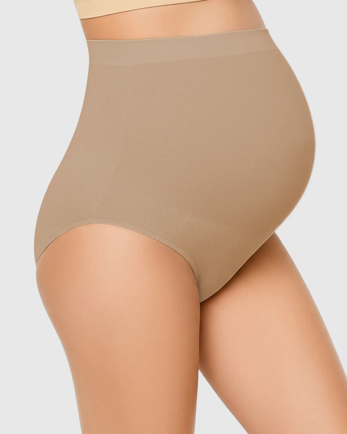 Seamless high-waist maternity underwear in nude, offering belly support and a smooth fit.