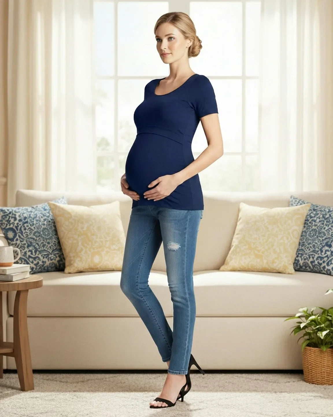 Pregnant woman in a navy stretch-fit V-neck nursing t-shirt and jeans.