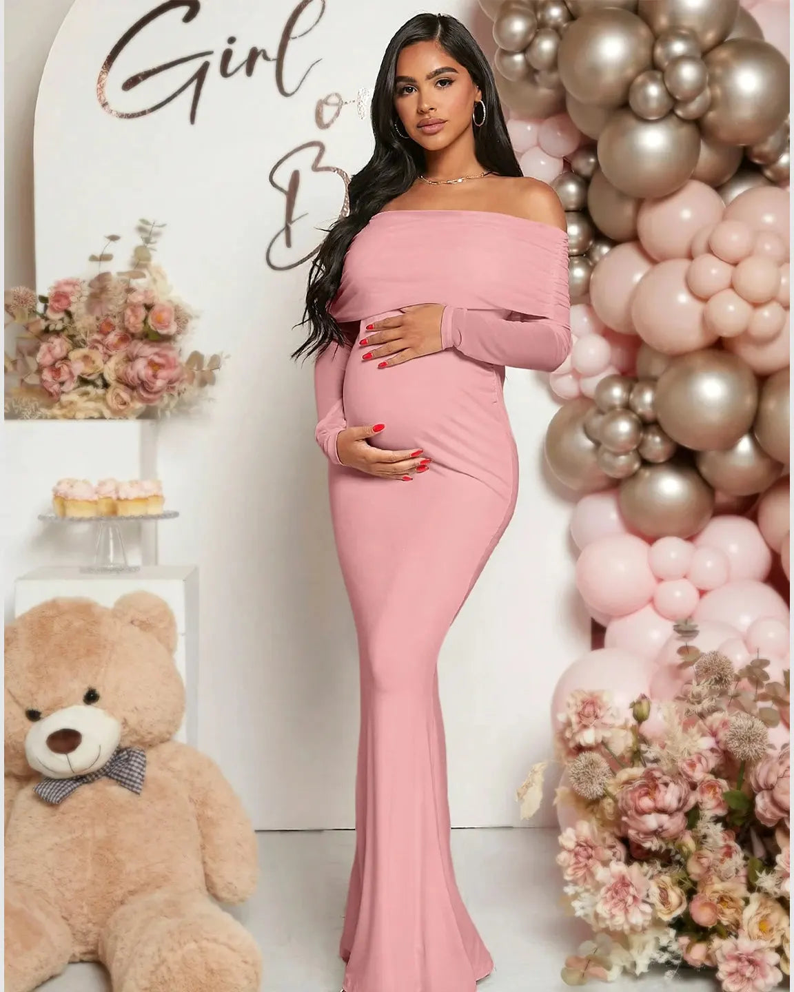 Pink off-shoulder draped neck mermaid fit maternity maxi dress on a pregnant woman.