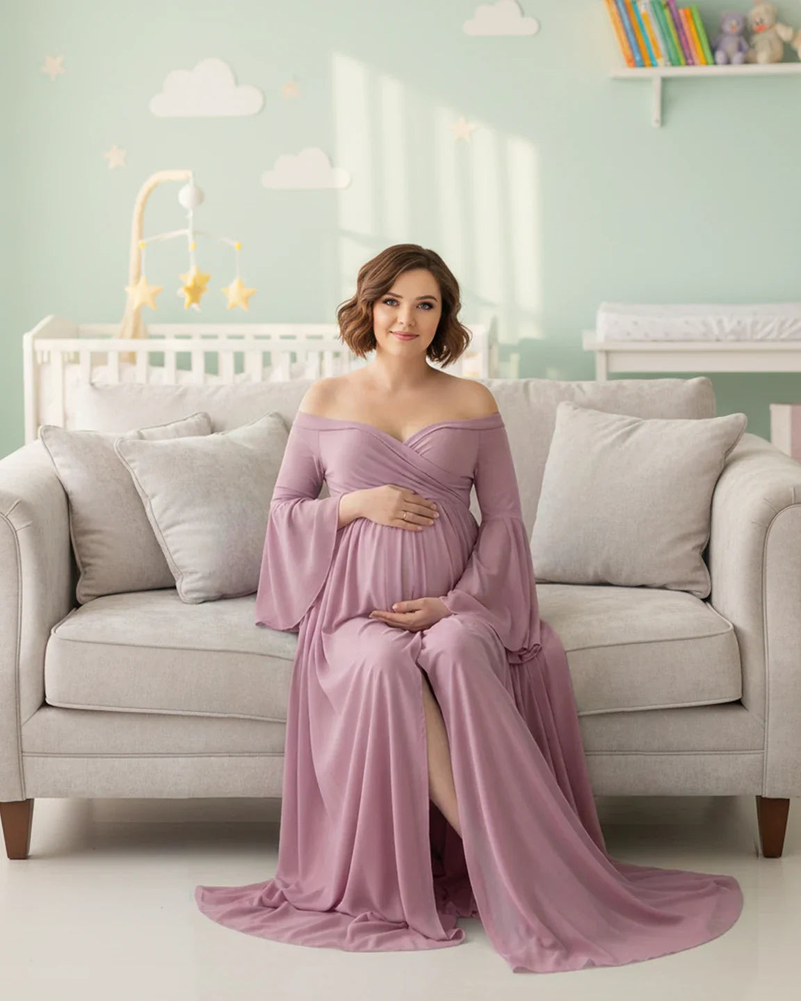 Maternity photoshoot gown: mauve, off-shoulder, bell sleeves, long train, chiffon, on a pregnant woman.