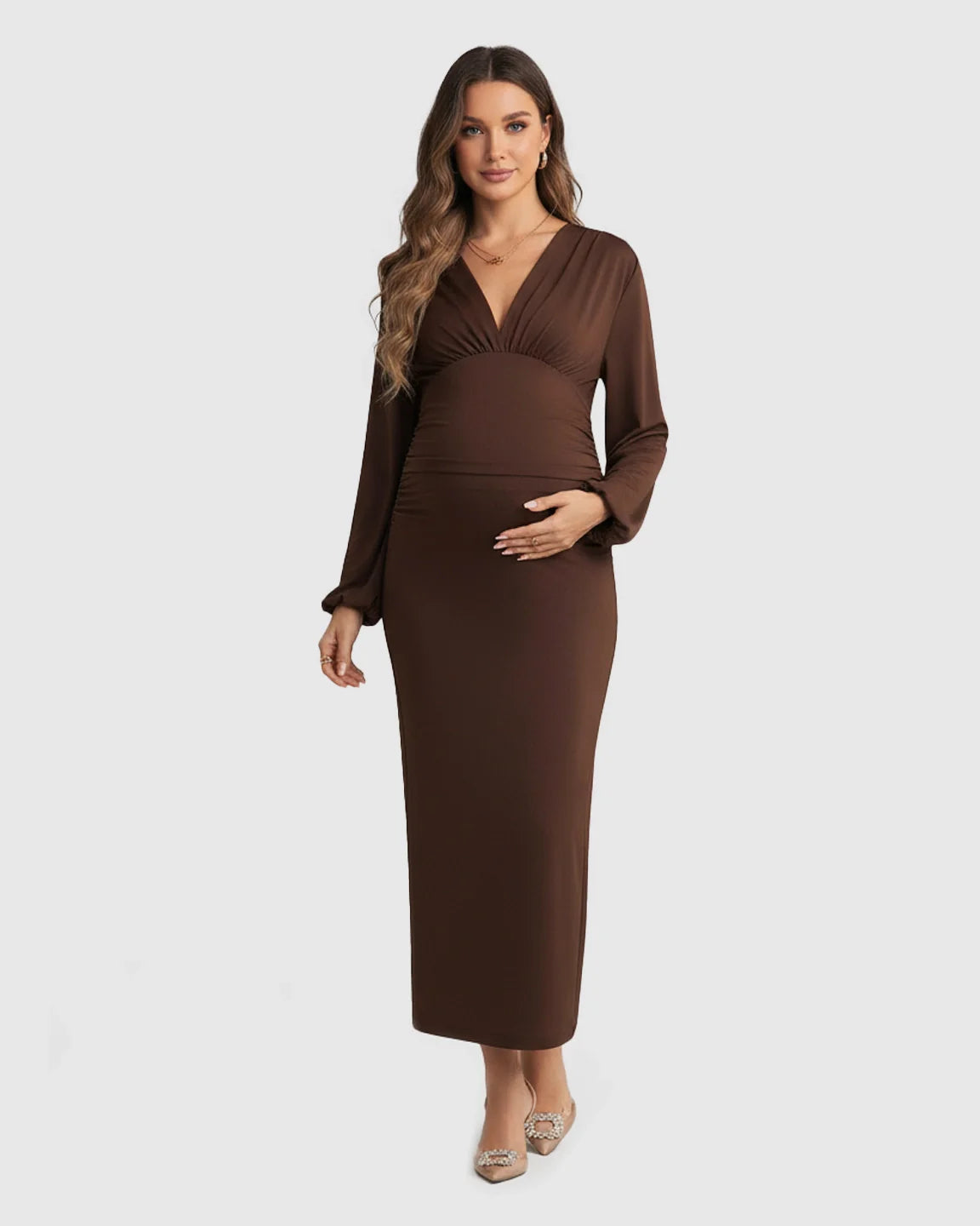 Elegant brown long-sleeve bodycon maternity maxi dress with deep V-neckline, soft stretch jersey.