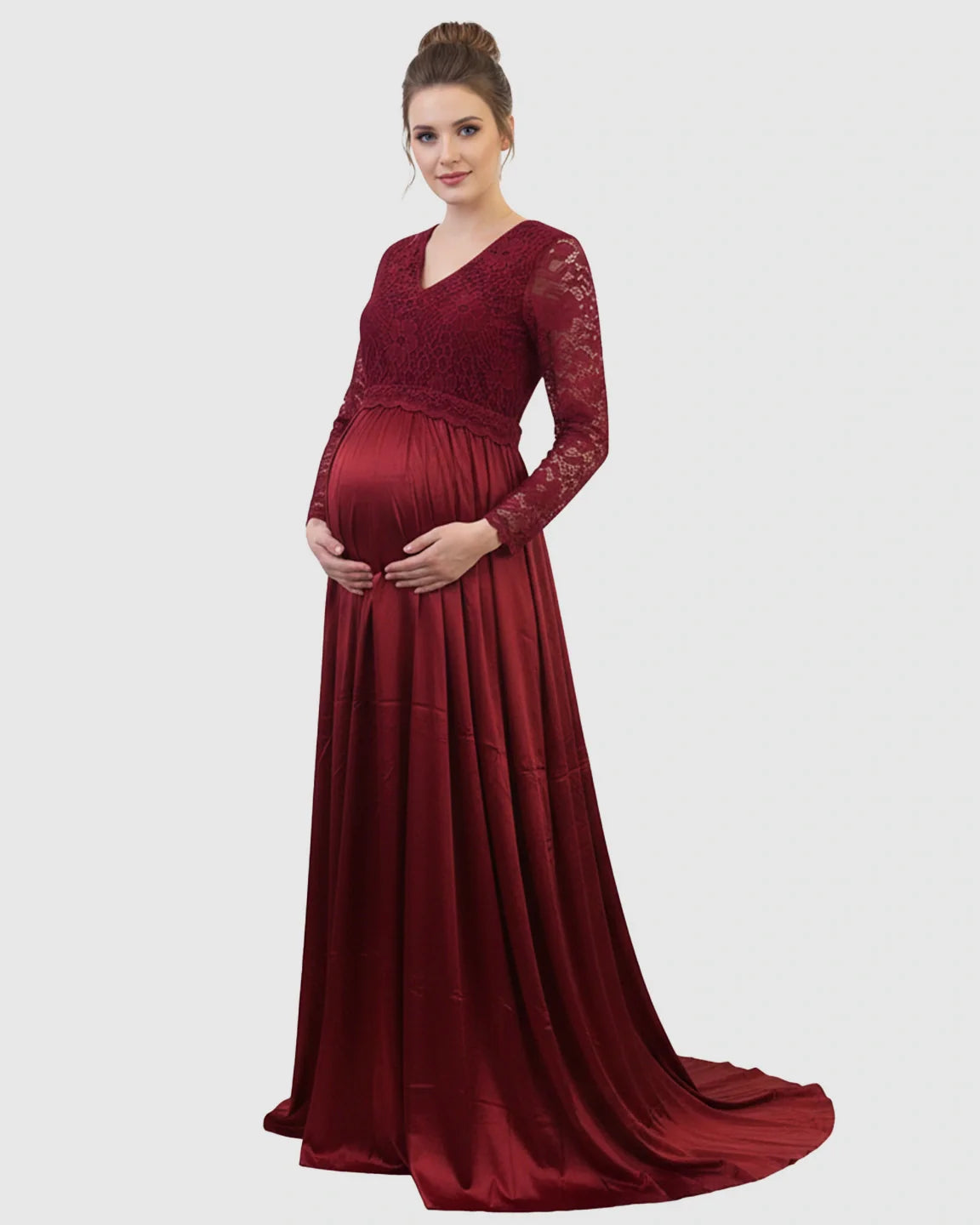Red lace-spliced bodice maternity maxi dress with V-neck, long sleeves, and trailing skirt.