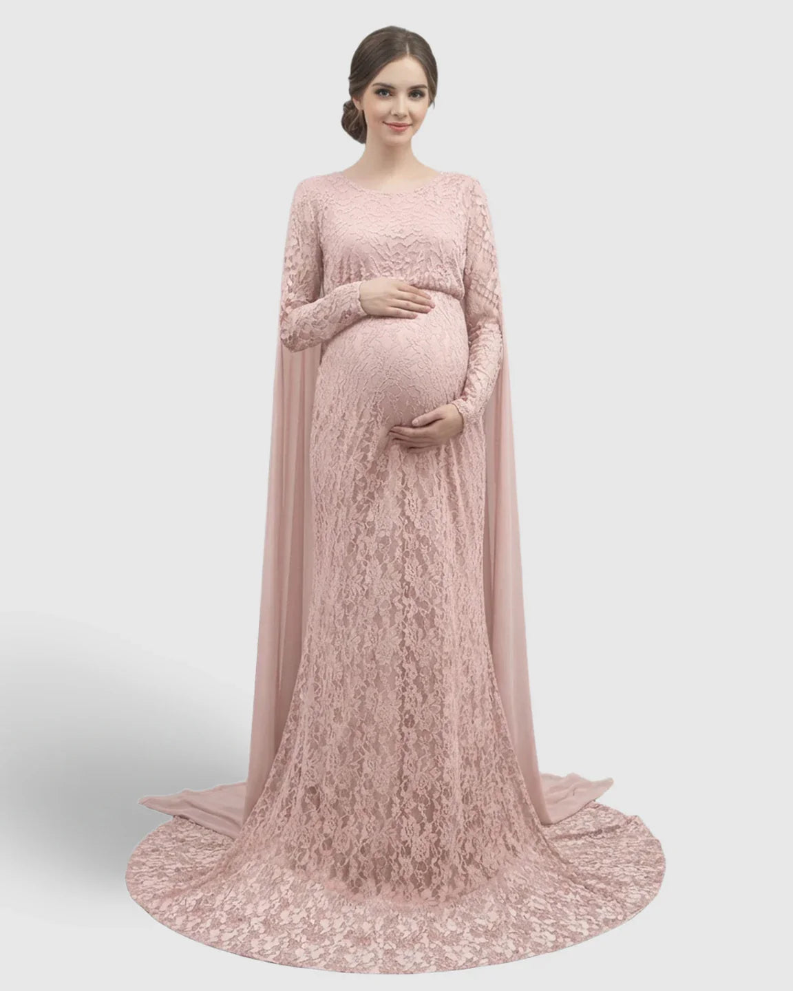 Pink lace cape trailing maternity gown with long sleeves and empire waist.