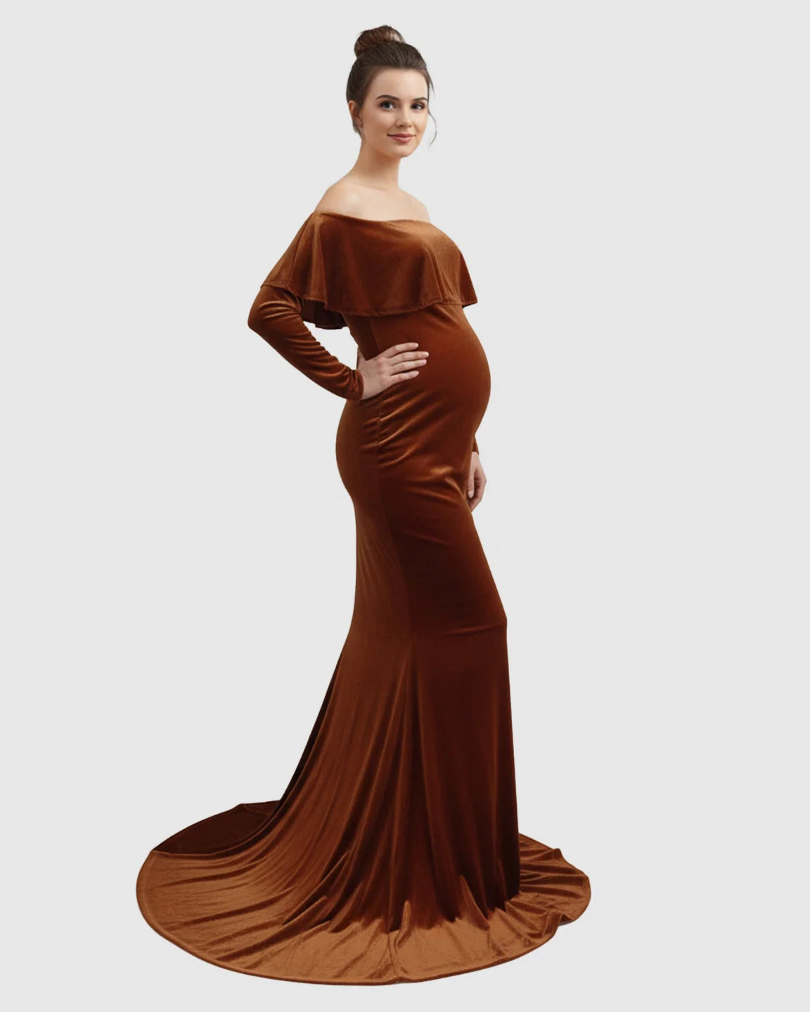 Elegant brown velvet off-shoulder maternity gown with a flowing train, highlighting a pregnant woman's bump.