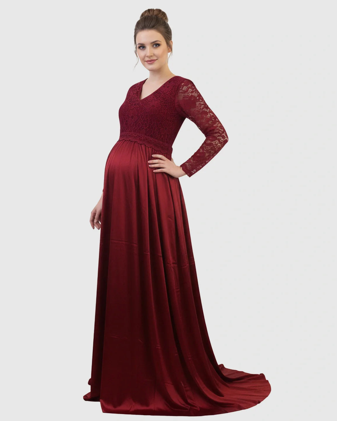 Red lace-spliced bodice maternity maxi dress with V-neck and trailing skirt.