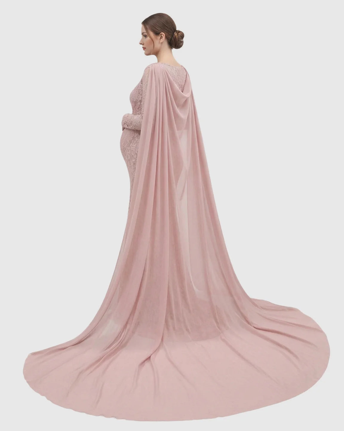 Pink lace maternity gown with long chiffon cape trailing, long sleeves, and empire waist.