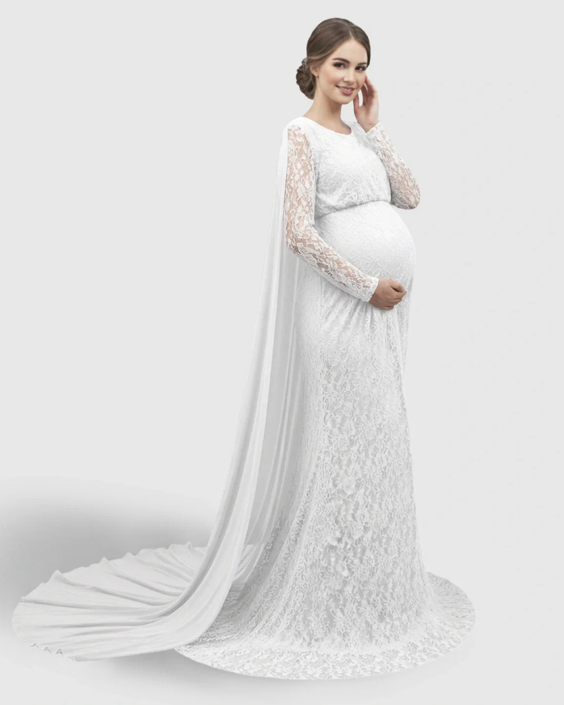 White lace maternity gown with long sleeves, empire waist, and a flowing trailing cape.