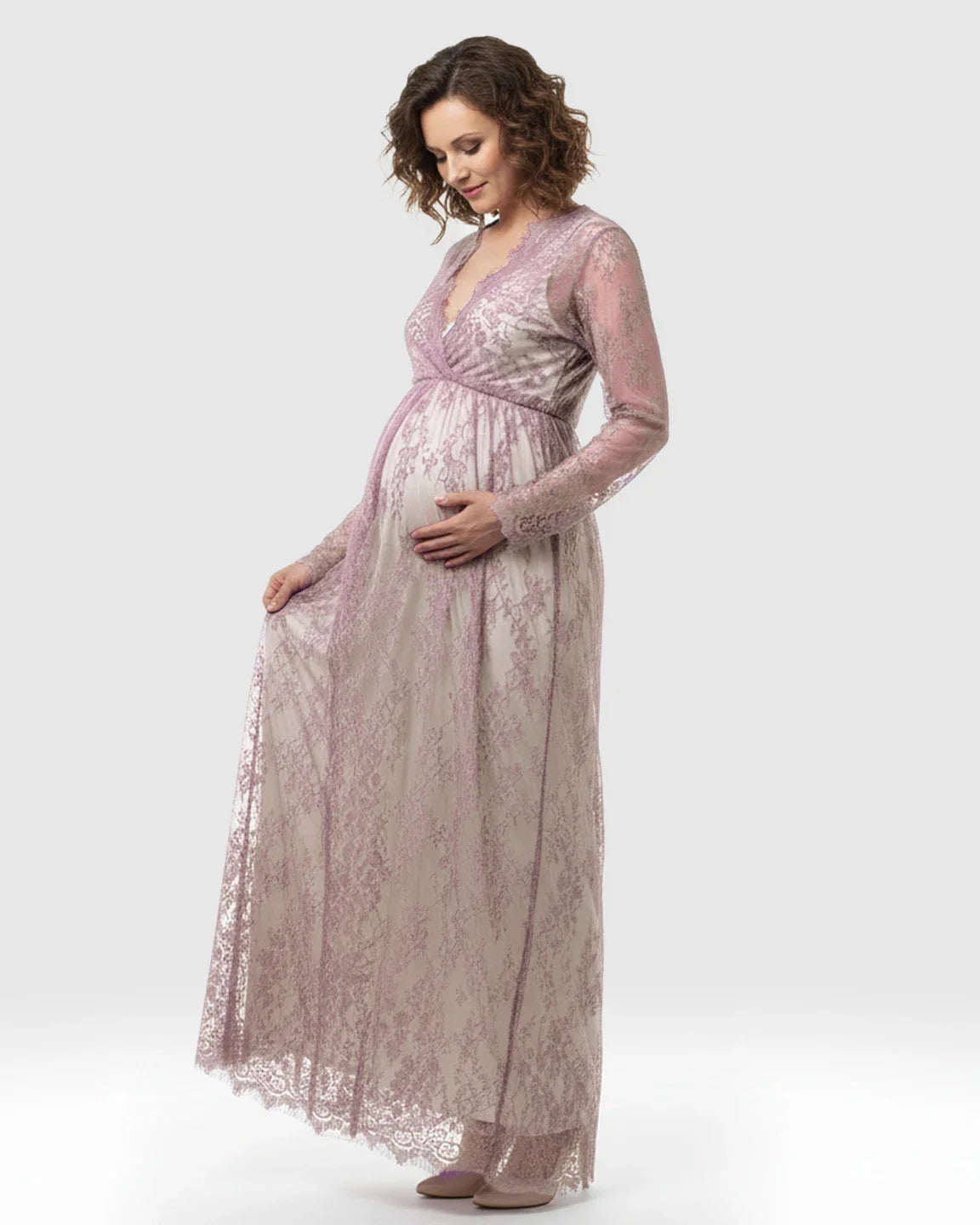 Maternity maxi dress in sheer floral lace, featuring a mauve empire waist, V-neck, and long sleeves.