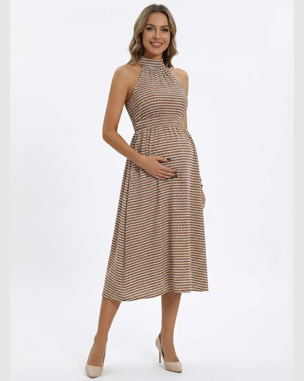 Maternity midi dress with halter mock neck, sleeveless style, and brown geometric print.