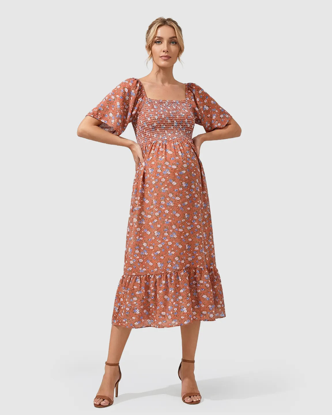 Rust floral flutter-sleeve smocked maternity midi dress with tiered skirt.