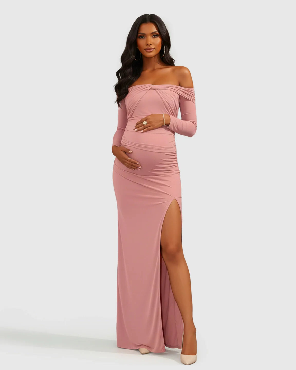 Pink ruched off-shoulder bodycon maternity dress with long sleeves and a high slit.