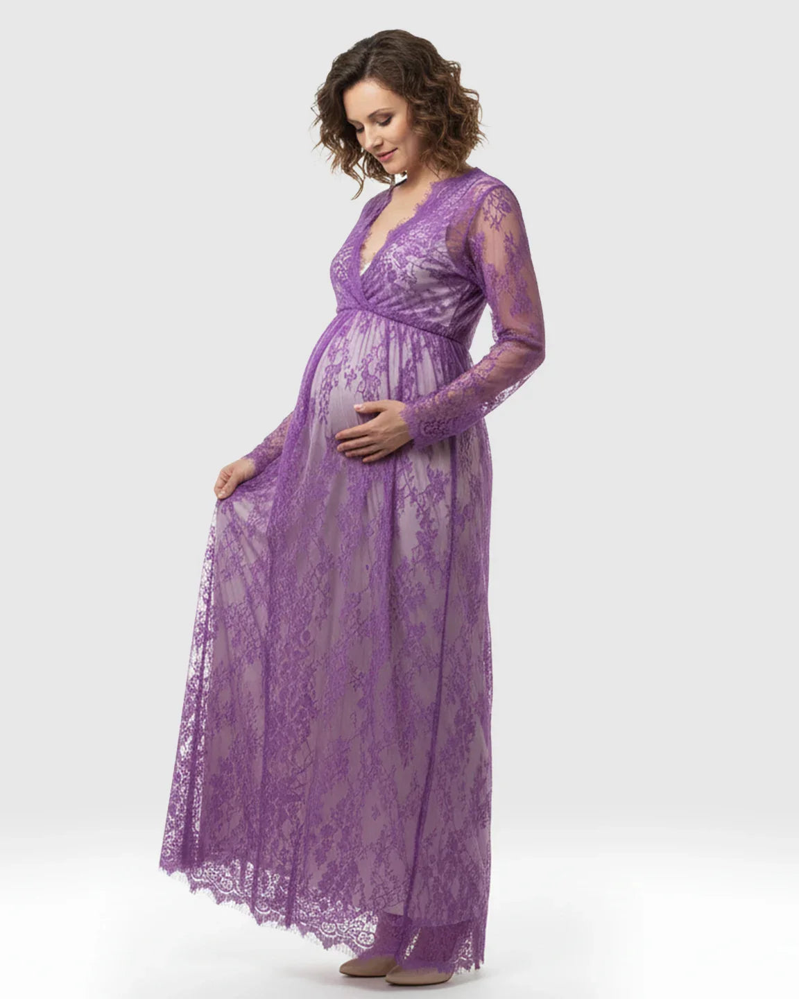 Maternity maxi dress in sheer purple floral lace, featuring an empire waist and V-neck.