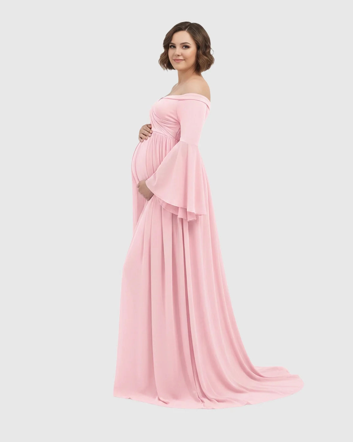 Pink off-shoulder maternity photoshoot gown with bell sleeves and a long train.