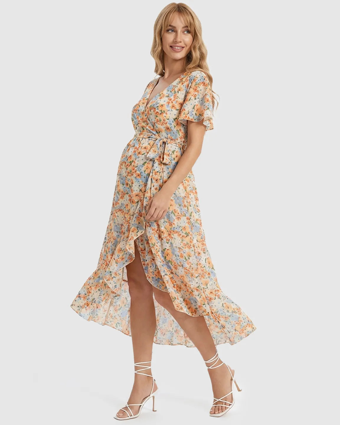Maternity midi dress with a floral print, V-neck, ruffled hem, and tie waist.