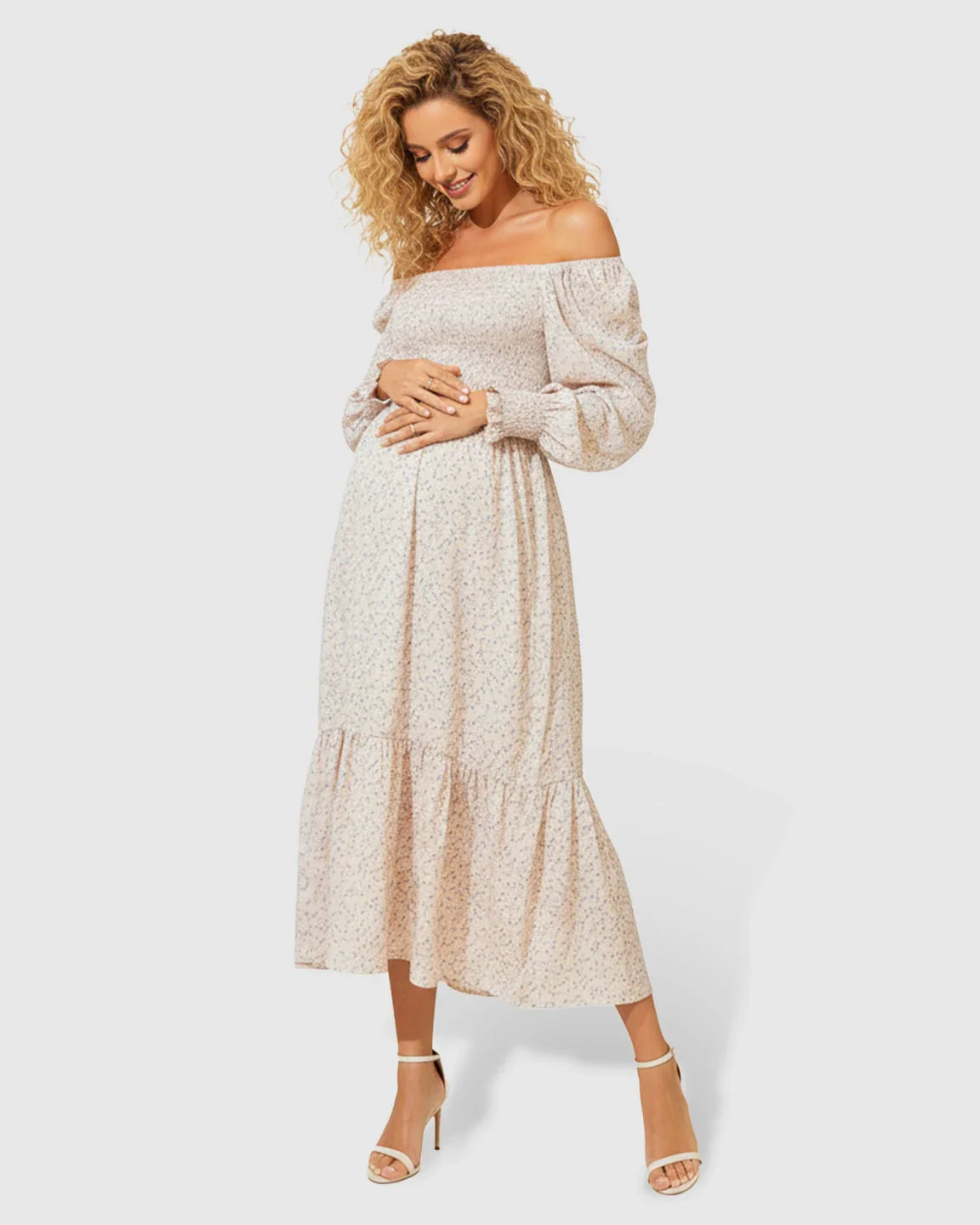 Maternity midi dress: off-shoulder, flowy, light beige with subtle floral print, smocked bodice, tiered skirt.