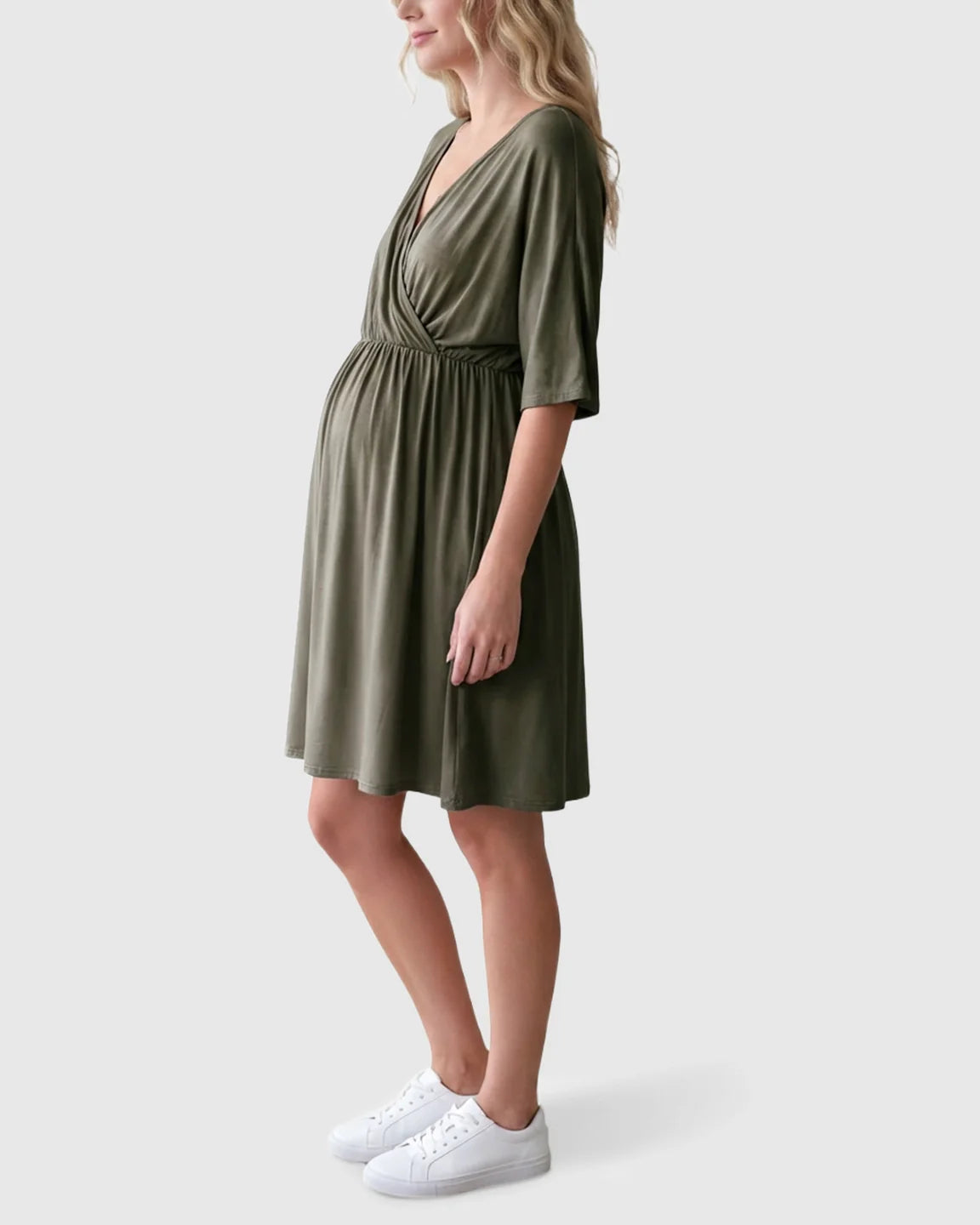 Maternity midi dress in olive green with a cross-front, V-neck, 3/4 sleeves, and flowy A-line silhouette.