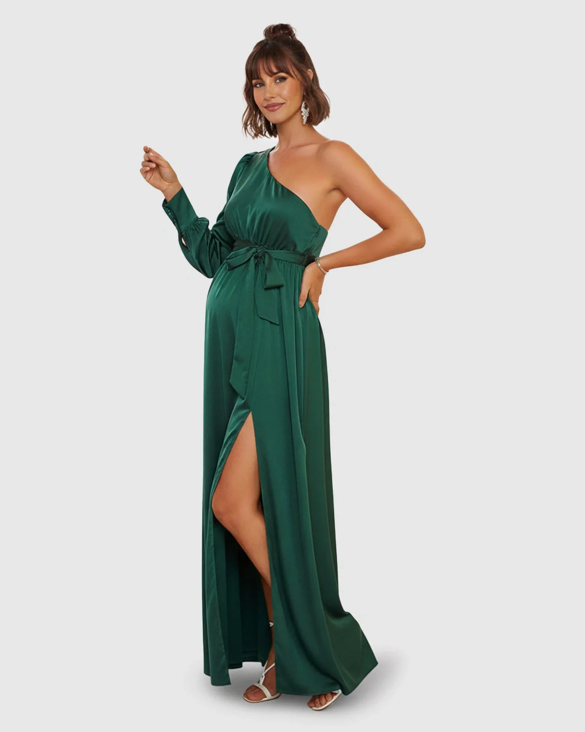 Elegant emerald green satin one-shoulder maternity maxi dress with a high slit and tie-waist.