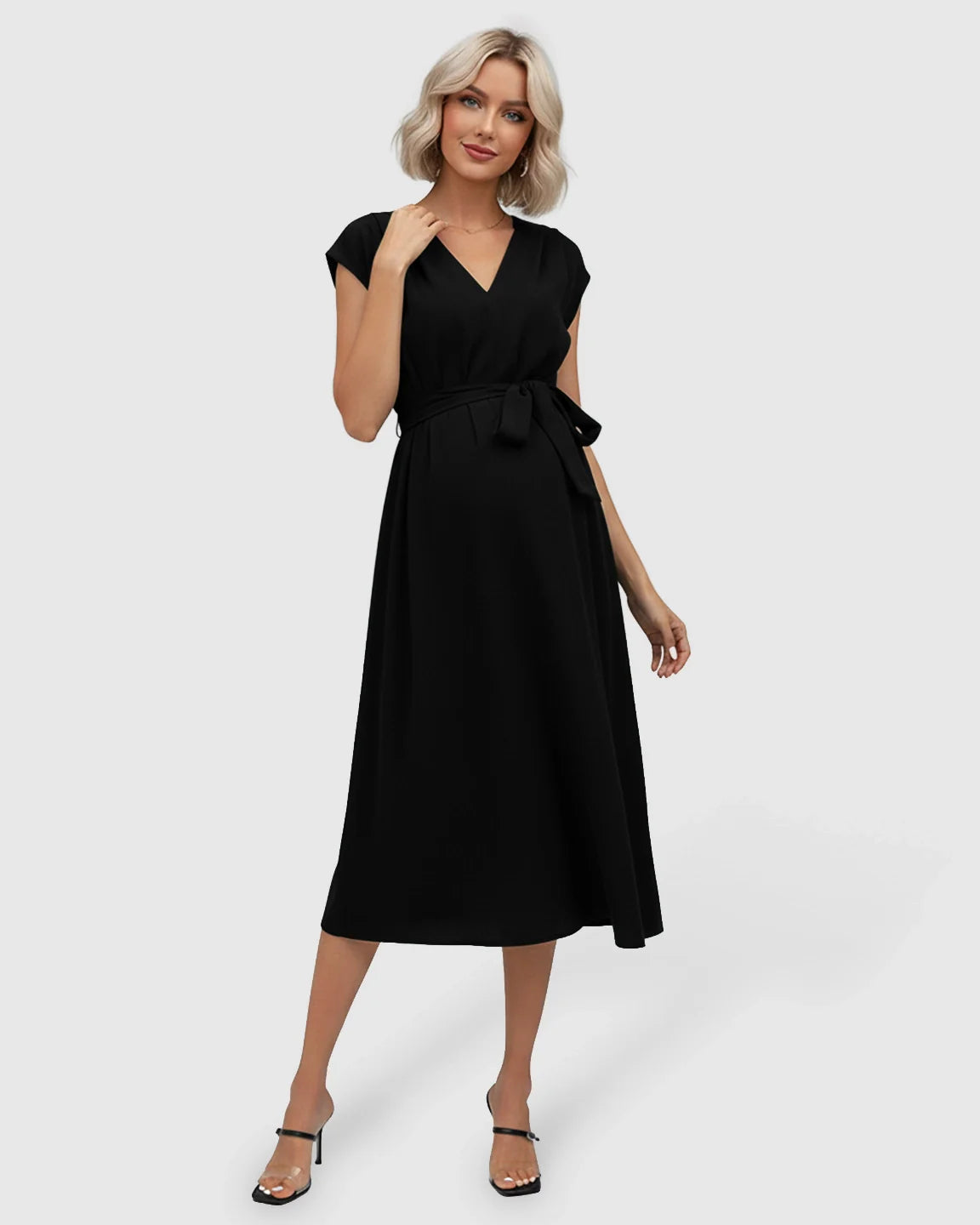 Black tie-waist V-neck maternity midi dress with flutter sleeves, worn by a blonde model.