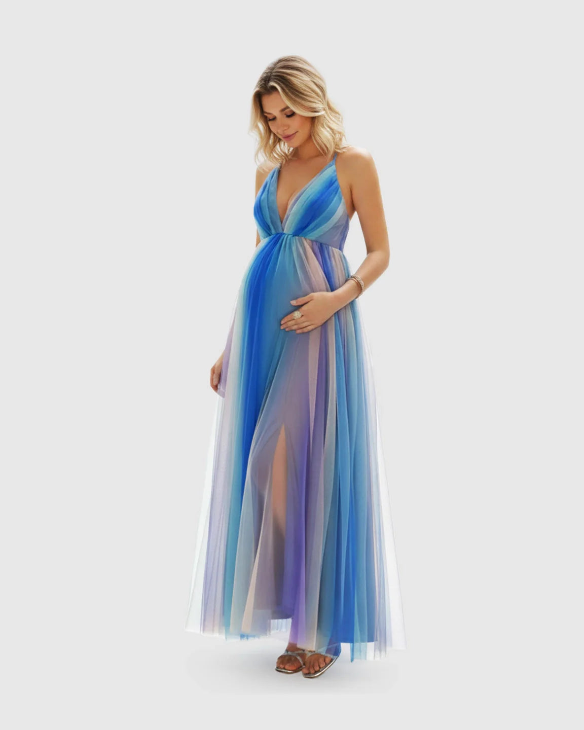 Maternity maxi dress in blue, purple, and white mesh with a deep V-neck, spaghetti straps, and crisscross back.