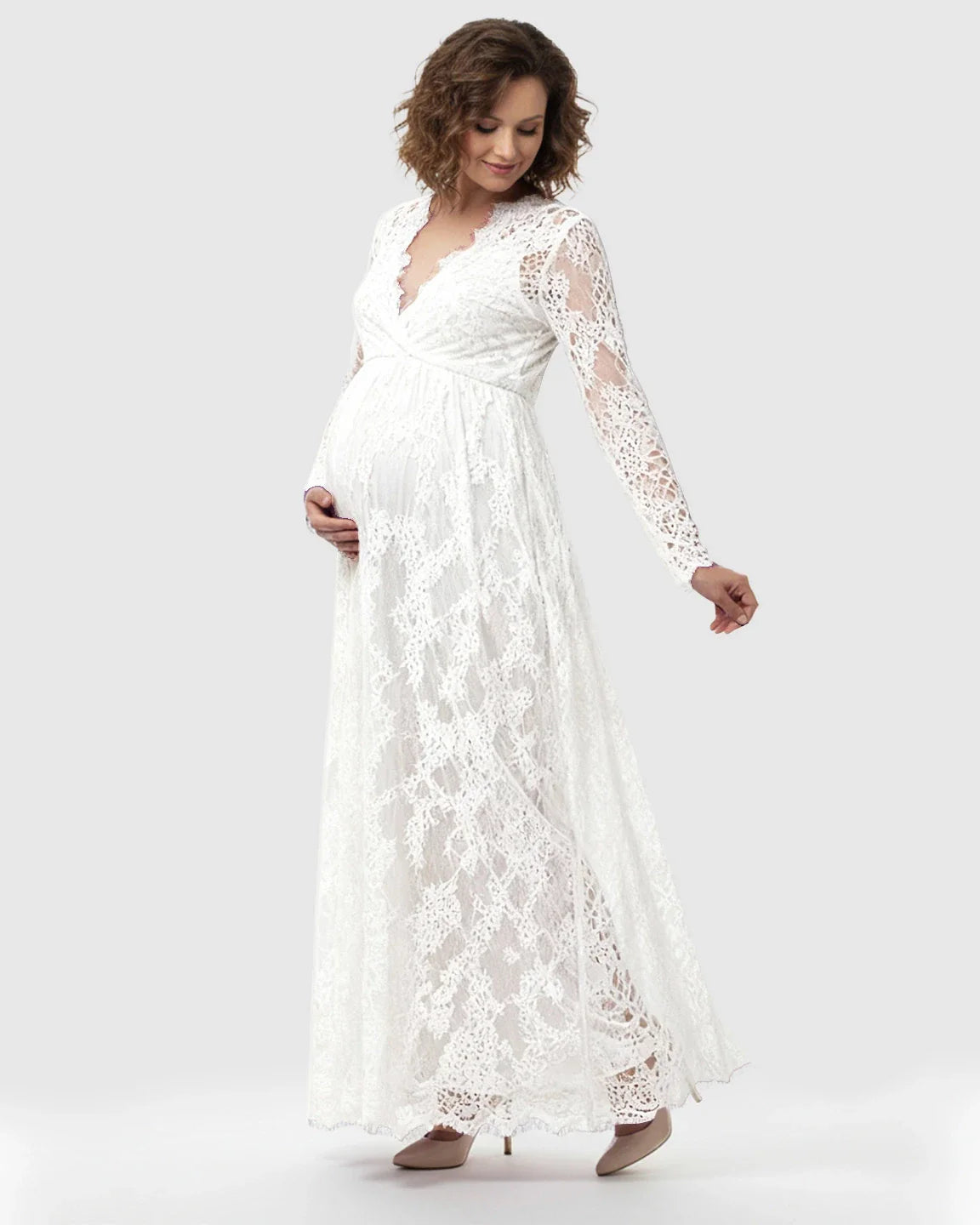 White sheer floral lace empire waist maternity maxi dress with long sleeves.